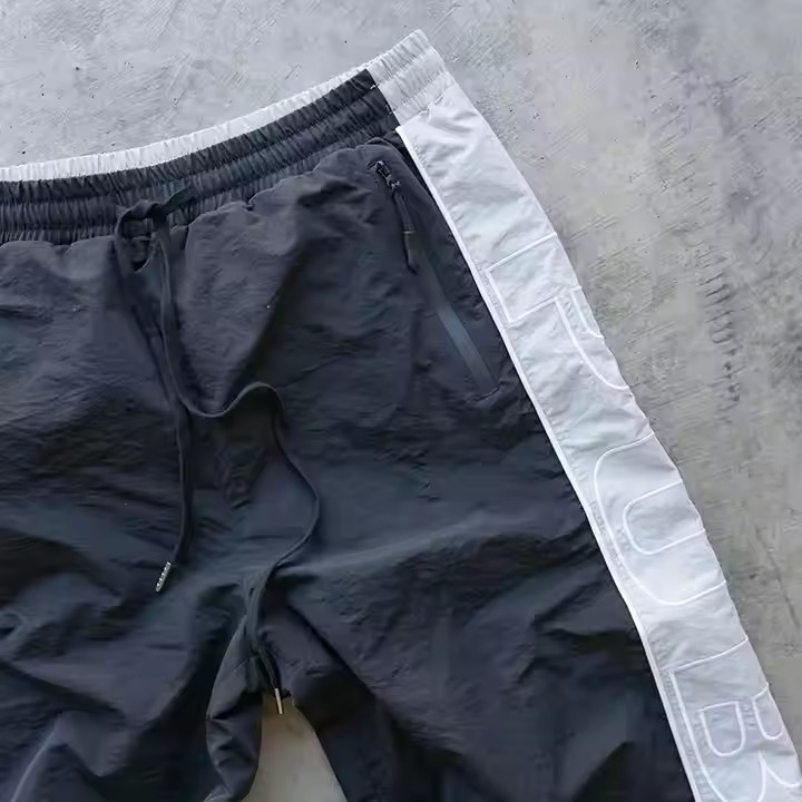 Custom High Quality Embroidery Sweat Jogger Pants Color Block Drawstring Lightweight 100% Polyester Nylon Track Pants